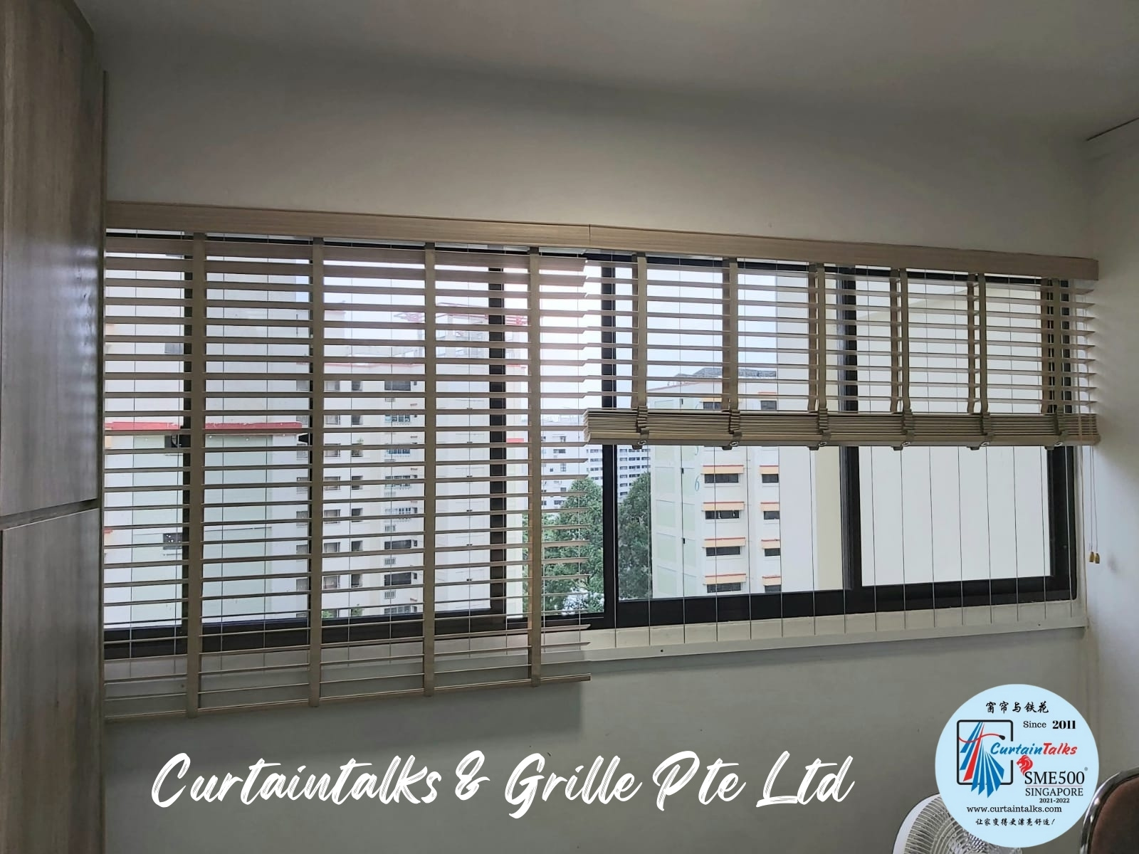 This is a Picture of Wooden blinds at Singapore HDB flat 655 Woodlands Ring Road, Living Hall